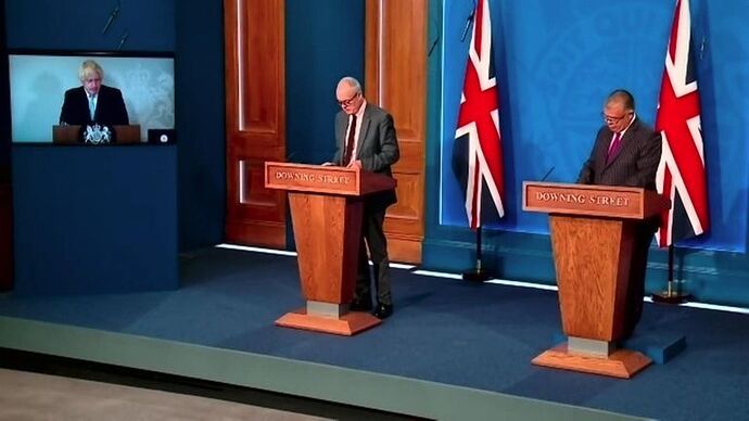 Boris Johnson, who is isolating, leads a COVID news conference on 19 July
