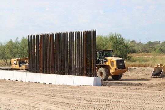 Construction crews build new sections of the Texas-funded border wall near Eagle Pass. (Photo: Randy Clark/Breitbart Texas)