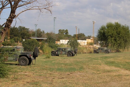 Texas National Guard troops park along the Rio Grande near the Eagle Pass Boat Ramp. (Photo: Randy Clark/Breitbart Texas)