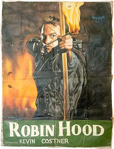 Poster of Robin Hood with a person aiming an arrow, holding a torch. Text reads "ROBIN HOOD, KEVIN COSTNER." Fiery background, intense mood.