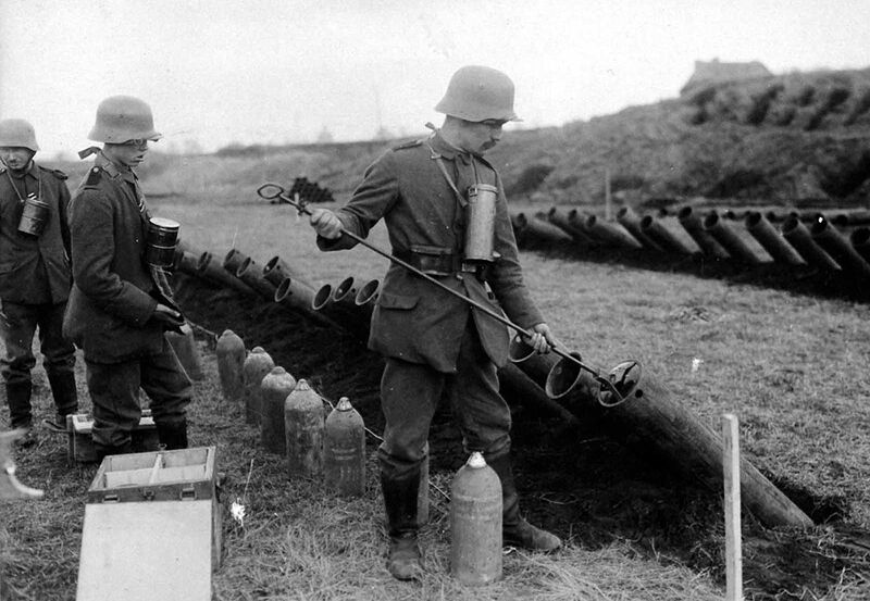 German troops load gas projectors. Attempting to exploit a loophole in international laws against the uses of gas in warfare, some German officials noted that only gas projectiles appeared to be specifically banned, and that no prohibition could be found against simply releasing deadly chemical weapons and allowing th wind to carry it to the enemy.