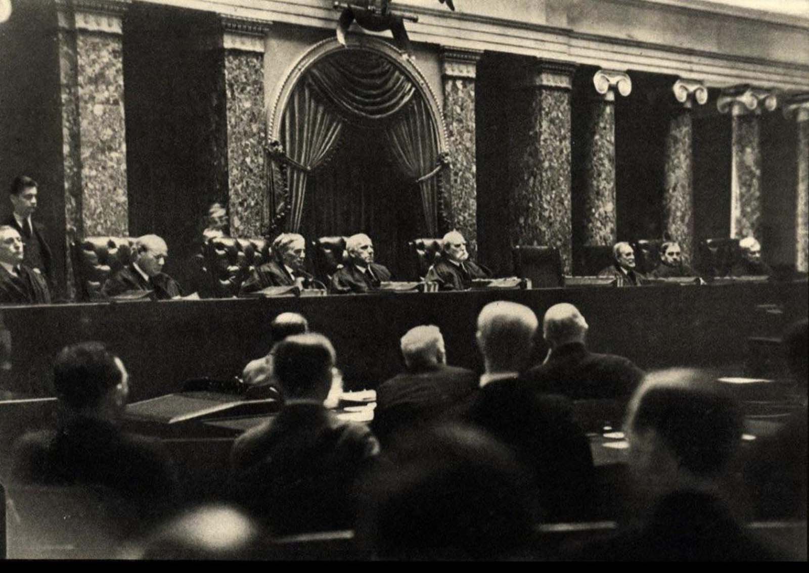 Illegal picture taken inside the US Supreme Court in 1932. Dr. Erich Salomon faked a broken arm so he could hide a camera in his cast.