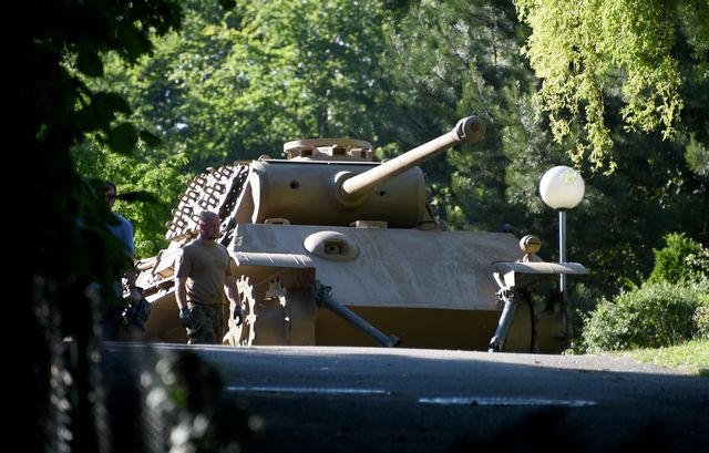 a panther battle tank is ready for transport on a residential property in heikendorf, germany, 02 july 2015 since 01 july, police and armed forces are removing recently discovered military equipment from world war ii including the panther tank, weapons and a torpedo the armoured recovery vehicle is used for safe transportation of weapons photo carsten rehderdpa usage worldwide photo by carsten rehderpicture alliance via getty images
