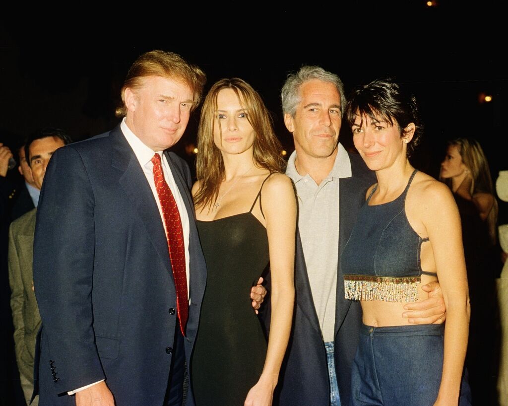 American real estate developer Donald Trump and his girlfriend (and future wife), former model Melania Knauss, financier (and future convicted sex offender) Jeffrey Epstein, and British socialite Ghislaine Maxwell pose together at the Mar-a-Lago club, Palm Beach, Florida, February 12, 2000.
