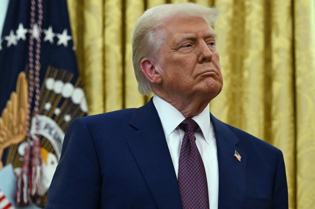 President Donald Trump listens as the new US Secretary of Health and Human Services Robert F. Kennedy Jr., speaks after being sworn in at the Oval Office of the White House in Washington, DC, on February 13, 2025.