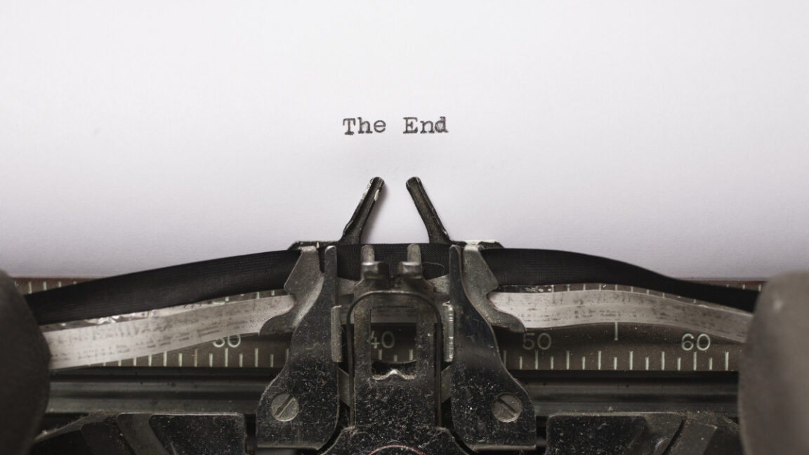 Photo of a typewriter that has typed out "The End" on a piece of paper.